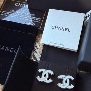 CHANEL Silver and White Interlocking CC Stud Earrings